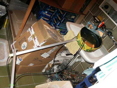 Additional roll of coax cable placed in a metal can